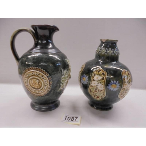 1087 - A Doulton Slater ewer (chip to base) and a Doulton Lambeth vase (chip to rim).