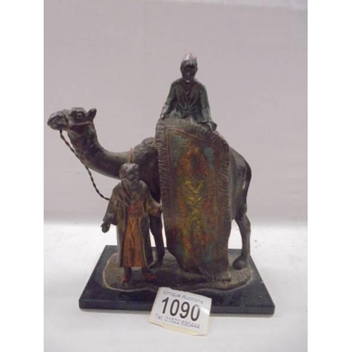 1090 - An Austrian cold painted spelter carpet seller seater on a camel.