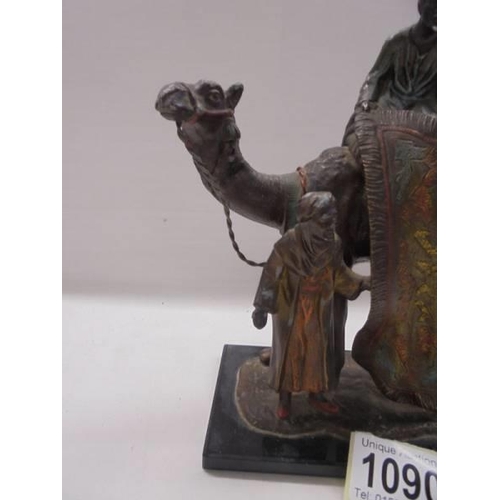 1090 - An Austrian cold painted spelter carpet seller seater on a camel.