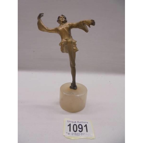 1091 - An art deco spelter figure of a dancer, dancer 13cm, total height 16 cm.