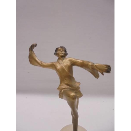 1091 - An art deco spelter figure of a dancer, dancer 13cm, total height 16 cm.