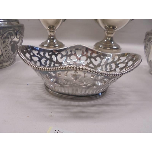 1094 - A silver plate jug, sugar bowl, sweetmeat dish and two planters.