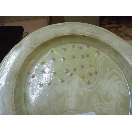 1097 - A Chinese 'Celadin' style tea plate.