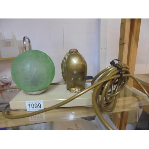 1099 - An art deco lamp on a marble base with a dove and a green globe shade.