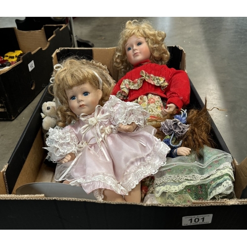 101 - A box of porcelain dolls