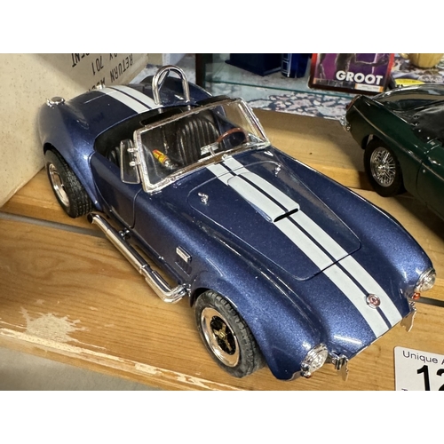 121 - 2 Boxed Crestley Collection diecast MGB & AC Cobra model cars