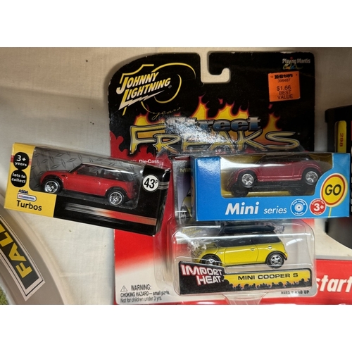 123 - A Corgi 298 Ferrari 308 GTS & other Diecast by various brands