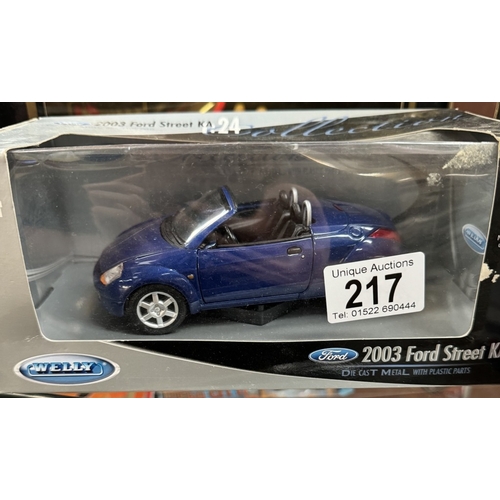 217 - 3 Boxed Burago 1/18 scale cars including Jaguar e-type, A Maistro Volkswagen beetle & Ford Street KA