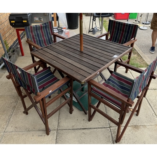 210 - A hardwood garden set table, 4 chairs & Parasol