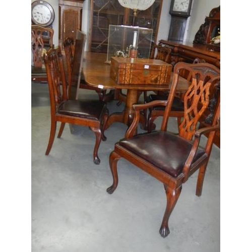 1774 - A good quality double pedestal extending oak dining table with one leaf and seven dining chairs, (ta... 