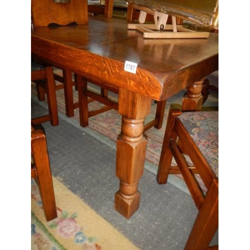 1787 - A heavy thick top oak dining table (200 x 82 cm) together with a set of six chairs. COLLECT ONLY.