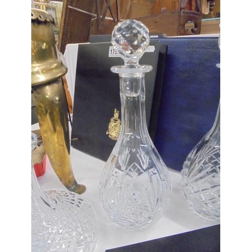 1801 - A pair of cut glass decanters and a cut glass ships decanter.