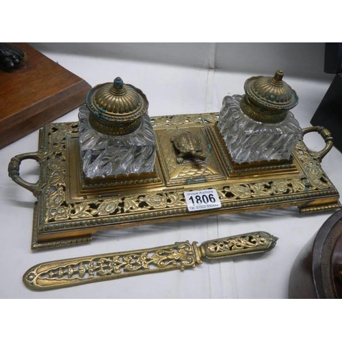 1806 - A double brass inkstand and a brass letter opener.