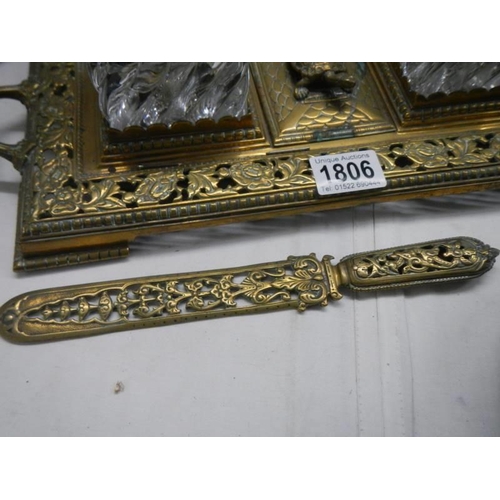 1806 - A double brass inkstand and a brass letter opener.