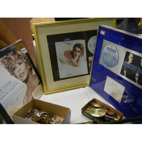 1812 - A framed and glazed Celine Dion disc, a framed and glazed Roachford disc and Tina Turner 'Silent Win... 