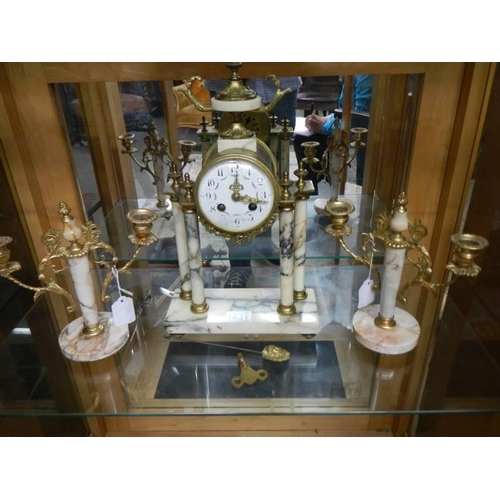 1831 - A three peice clock garniture with silk suspension, COLLECT ONLY.