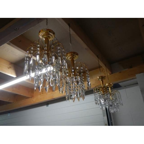 1838 - A set of four matching glass chandeliers.