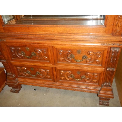 1839 - A glazed display cabinet on carved drawer base. COLLECT ONLY.