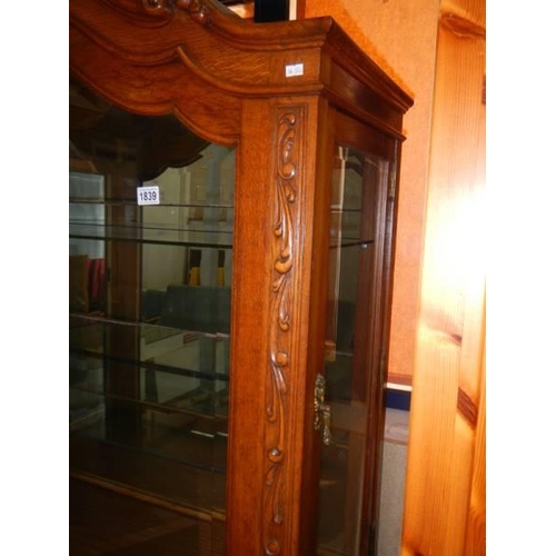 1839 - A glazed display cabinet on carved drawer base. COLLECT ONLY.