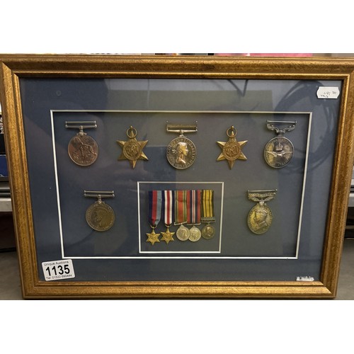 1135 - A framed and glazed cased medal display from Lesley Lorking including Africa General Service medal w... 