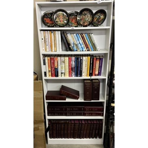 626 - A tall white bookshelf