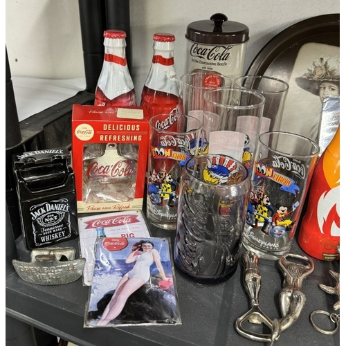 660 - A good selection of Coca Cola branded items including bottle opener, bottles (2 sealed) tin, glasses... 