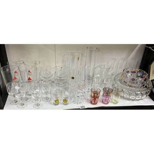 665 - A quantity of drinking glasses, including Bass advertising glasses and other glass items etc