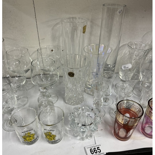 665 - A quantity of drinking glasses, including Bass advertising glasses and other glass items etc