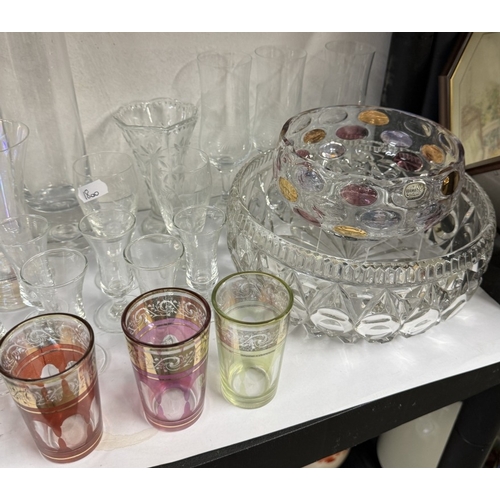 665 - A quantity of drinking glasses, including Bass advertising glasses and other glass items etc