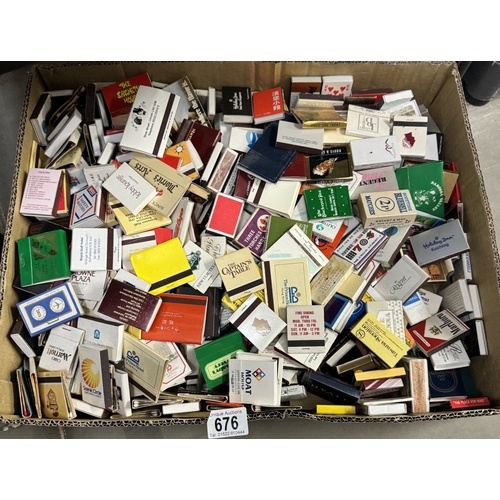 676 - A large collection of match books & match boxes