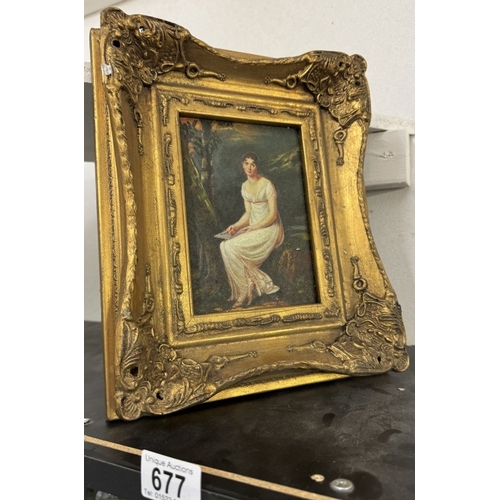 677 - A gilt framed enhanced print of a lady