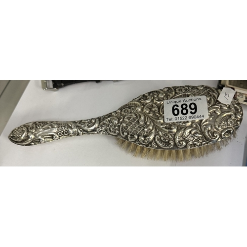 689 - A Victorian Chester silver mounted hair brush