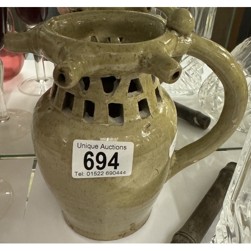 694 - A vintage Stoneware puzzle jug