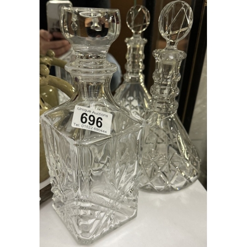 696 - 2 Glass decanters