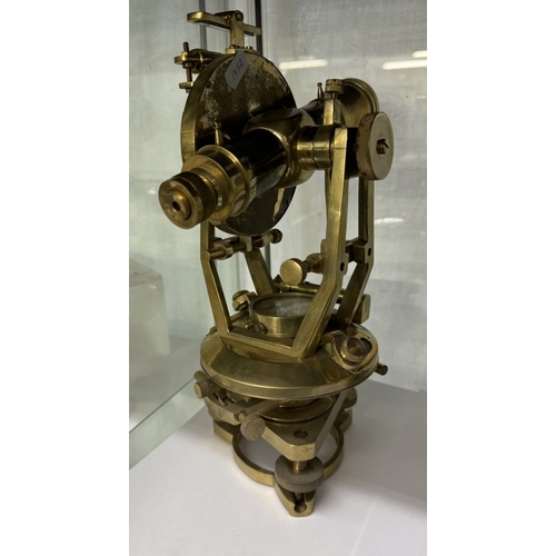 699 - A solid brass theodolite