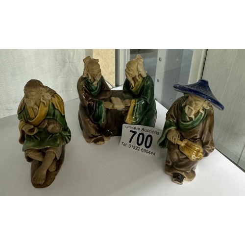 700 - 3 Vintage pottery figures of oriental men