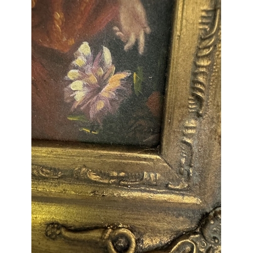 705 - A gilt framed enhanced print of a lady