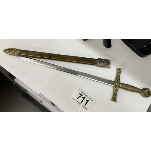 711 - 3 Small ornamental sword letter openers