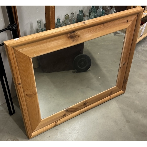 720 - An art deco style leaded mirror & a large pine frame mirror