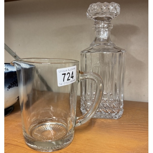 724 - A square glass decanter & a water jug