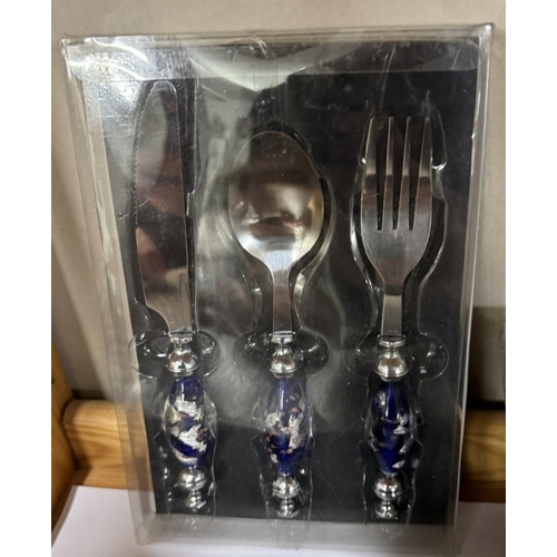 730 - 2 Silver plate spoon sets & 1 other