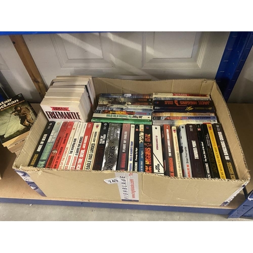 749 - A good lot of paperbacks including Jack Higgins, Alistair Maclean etc