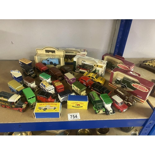 754 - A quantity of die-cast cars etc (some boxed)