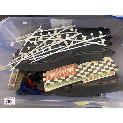 762 - A large box of Triang Scalextric track and hand controllers (no cars)