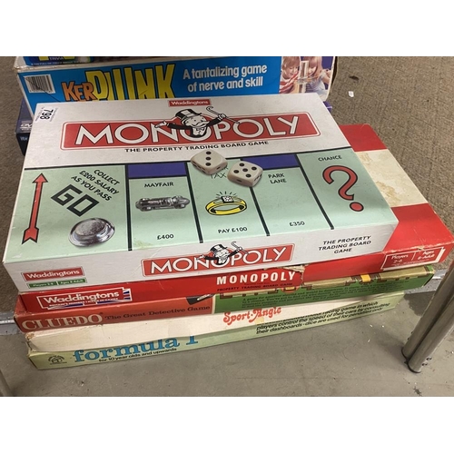 798 - A quantity of board games including Monopoly, Cluedo, Formula 1 etc