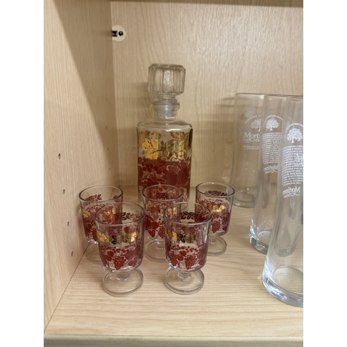 812 - A box of 12 Mortimer Orchard advertising cider glasses and a small decanter and 5 small glasses