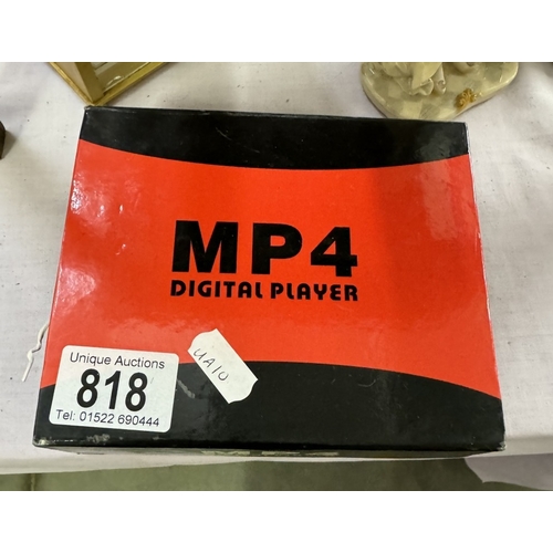 818 - A boxed mp4 digital player