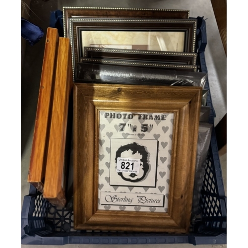 821 - A quantity of various sized picture frames etc