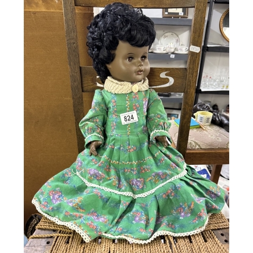 824 - A vintage doll