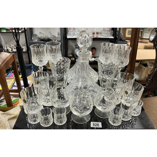 826 - A cut glass decanter and 1 other and a selection of drinking glasses